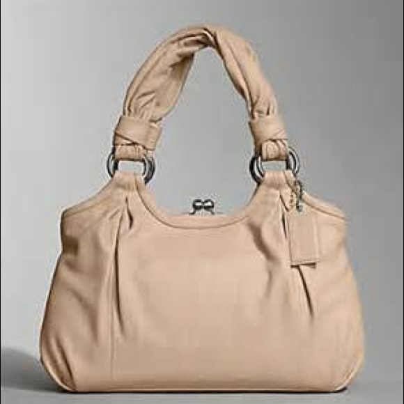 NWOT Coach Parker leather bag. Perfect condition.