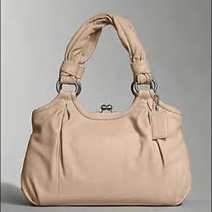 NWOT Coach Parker leather bag. Perfect condition.