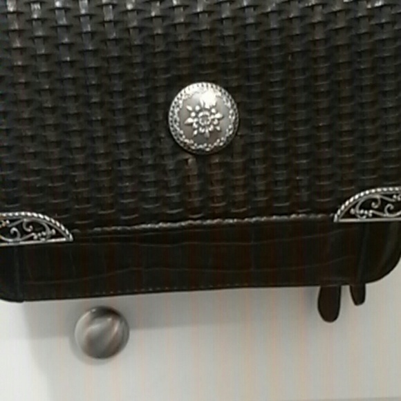 Black ,brown fo leather,with silver design,detail.