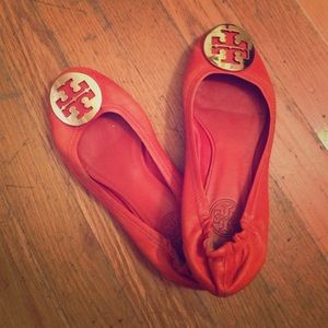 Tory Burch orange ballet flat with gold logo