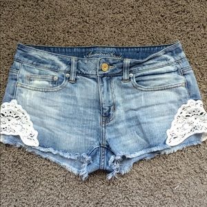 Denim cut offs with lace detail // size 6