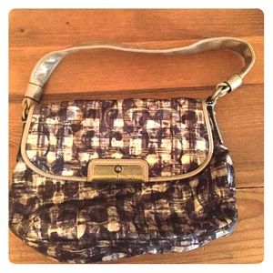 Black and gold jacquard coach bag