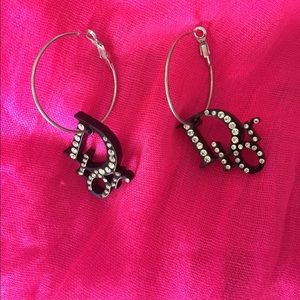 Silver and black earrings.