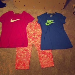 2 Nike shirts and workout pants