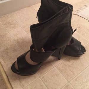 Black leather wedge shoes