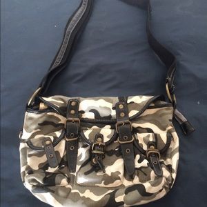 Camouflage over the shoulder purse.