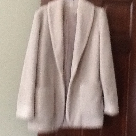 Beige fleece jacket.