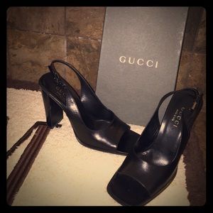 Stunning black Gucci sling back shoes.