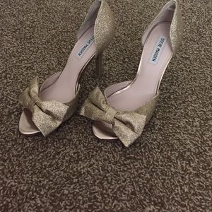 Steve Madden gold sparkly heel.