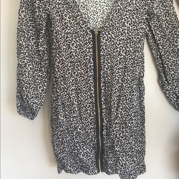 Mini dress with drop back, zipper back.