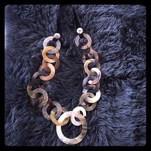 Amazing buffalo horn necklace.