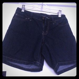 Blue jean Jessica Simpson 25 low rise shorts.