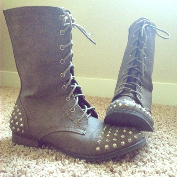 Studded combat boots.