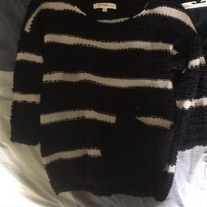 Black and cream striped sweater with pocket