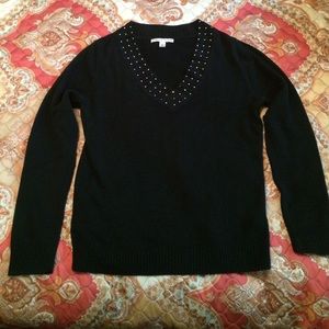 Long sleeve sweater with rhinestones around neck