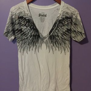 Sinful white tee with angel wings.