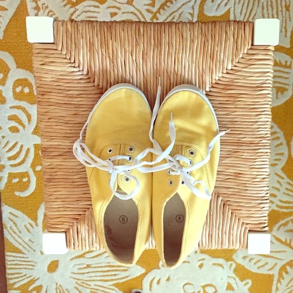 Cute yellow lace-up tennis shoes