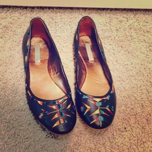 Black shoes with color.