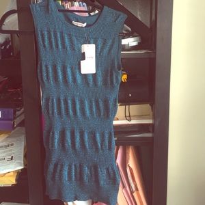 Cute dark teal green with glitter shimmer. Size M