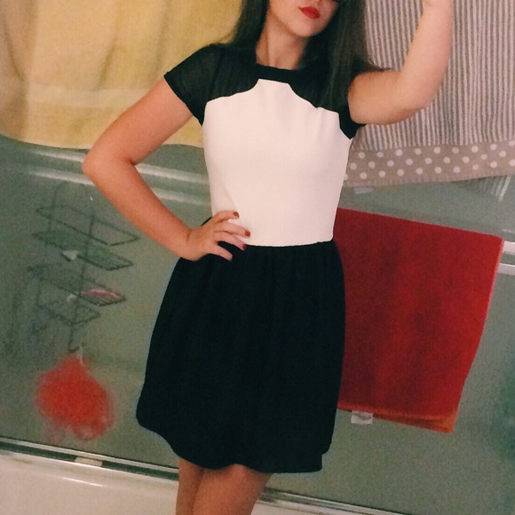 White and black dress with mesh black sleeves