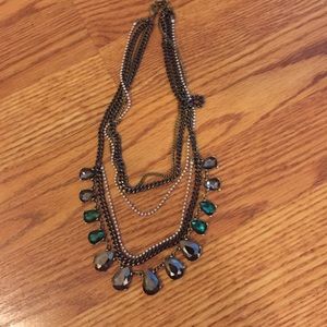 Express silver necklace with embellishments