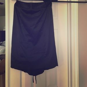 Black satin skirt, size 6. Gathered in back