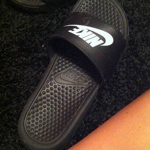 Nike slides.