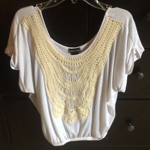 Boho crocheted slouchy white top.