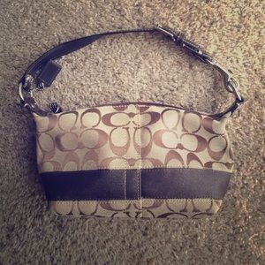Very small brown coach bag!