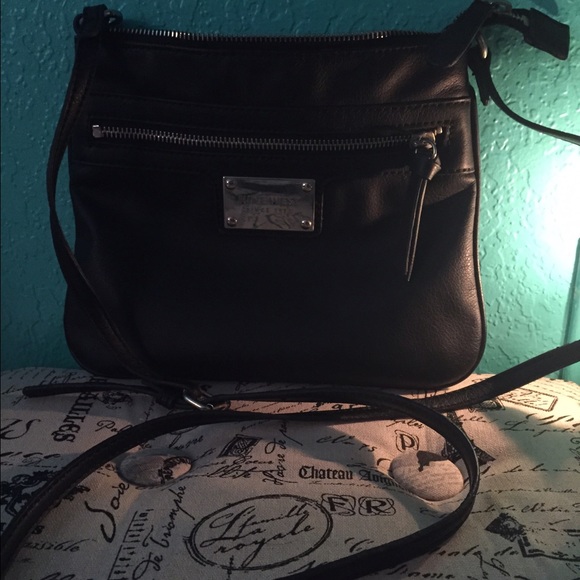 A black cross body Nine West bag