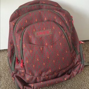 Red and Orange Dakine Patterned Backpack