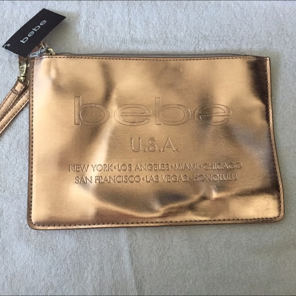 NWT Bebe rose gold envelope clutch