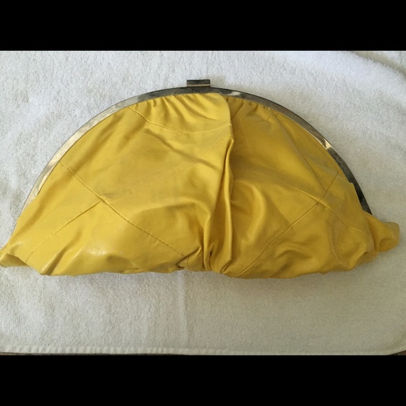 Yellow clam shell clutch