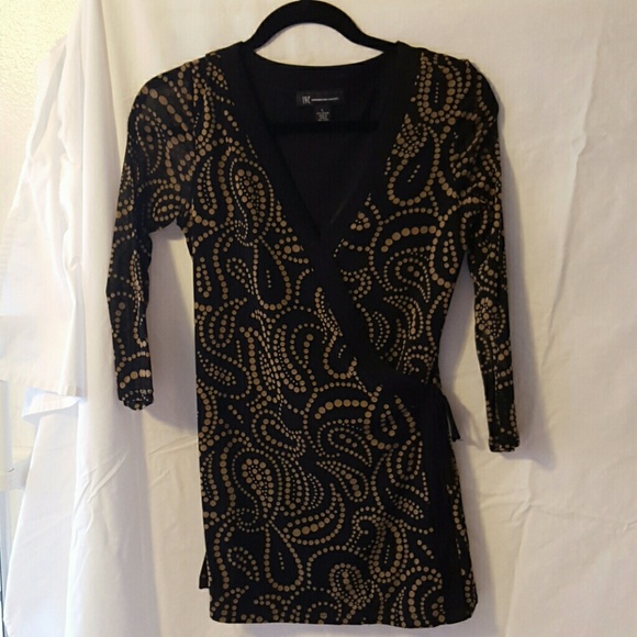 Wrap around top, fitted and very sexy