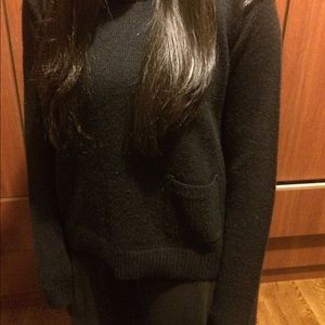 Black h&m sweater shirt with pocket on bottom