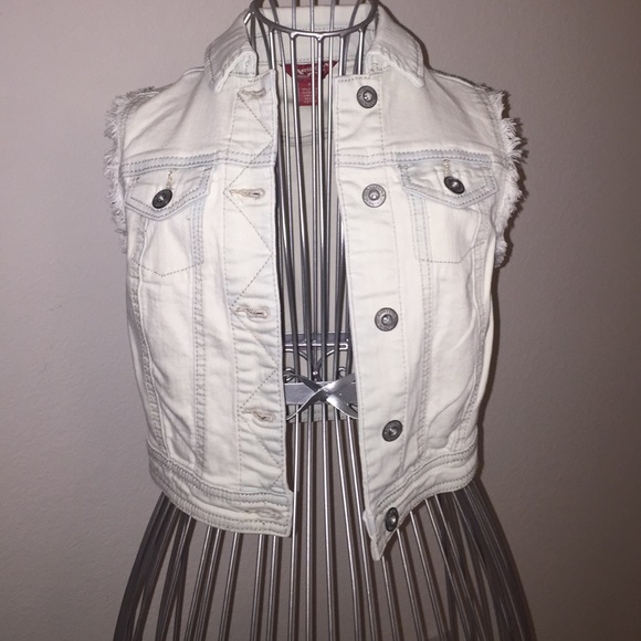 White sleeveless denim jacket