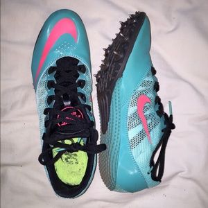 Teal Nike track spikes