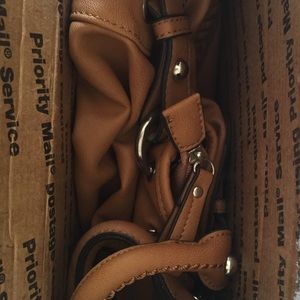 NOT FOR SALE. Brown purse