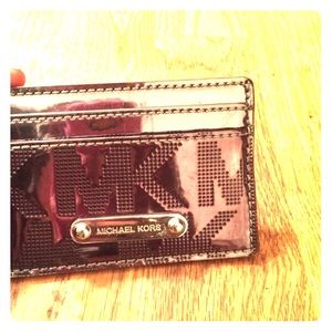 Real authentic MK credit card holder. Never used.