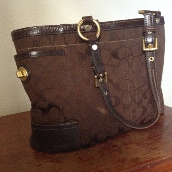 Coach purse, purple lining