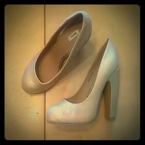 Distressed gold leather pumps