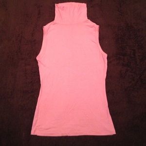 Pink sleeveless turtleneck