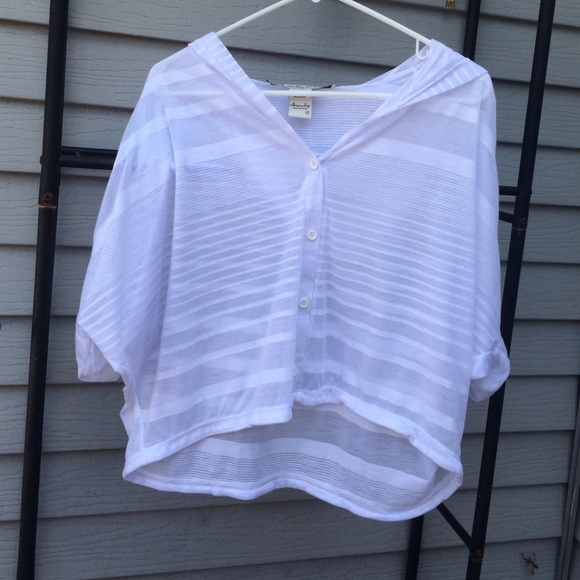 White shirt with hood.