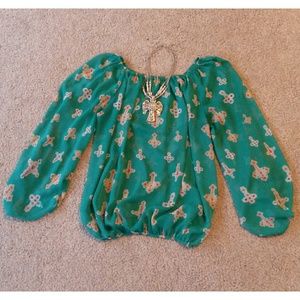 Cute crosses/turquoise top!