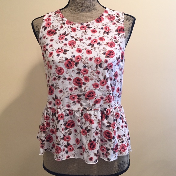 White peplum blouse with pink floral print