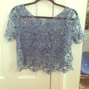 100 percent cotton lace top, slightly cropped fit