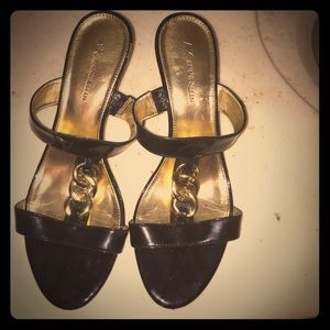 Black heels with gold chain decoration