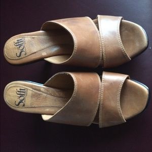 Sofft high heeled slip on sandals.