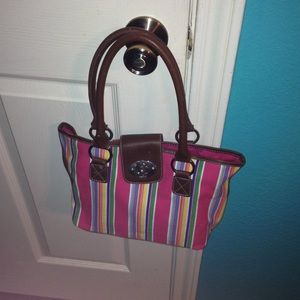 A multi colored chaps purse