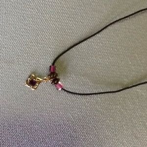 Delicate Necklace with Purple and Gold Accents